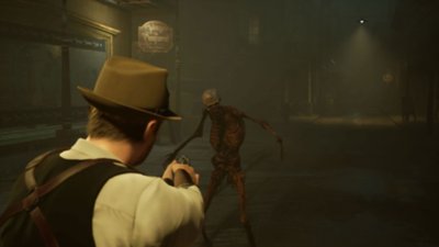 Alone in the Dark screenshot showing a man pointing a gun at a skeleton