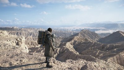 Death Stranding 2: On the Beach screenshot showing Sam with Lou overlooking rocky terrain with a city in the background