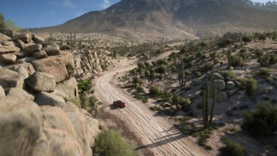 Gameplay screenshot from Forza Horizon 5 showing multiple offroad vehicles racing along dusty trail in rural Mexico.