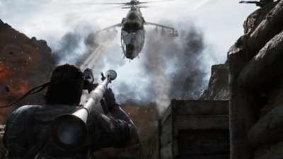 Captura de pantalla de Metal Gear Solid Delta: Snake Eater que muestra a Snake apuntando a un helicóptero con un lanzamisiles