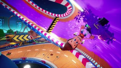 Nickelodeon Kart Racers 3: Slime Speedway – screenshot van Jimmy Neutron die met zijn motor over een slijmerige baan rijdt terwijl de andere racers op een baan eronder rijden