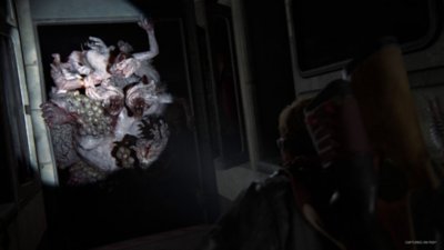The Last of Us Part II Remastered screenshot showing a terrifying, mutated zombie monster